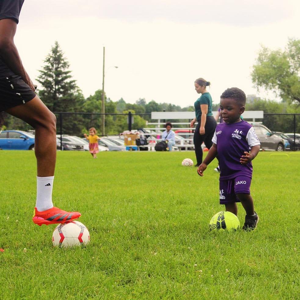 Tiny player with ball